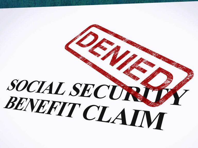 Red 'DENIED' stamp placed diagonally over a document labeled 'Social Security Benefit Claim'